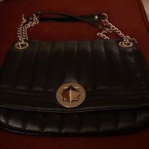 Kate spade quilted leather turn key lock gold